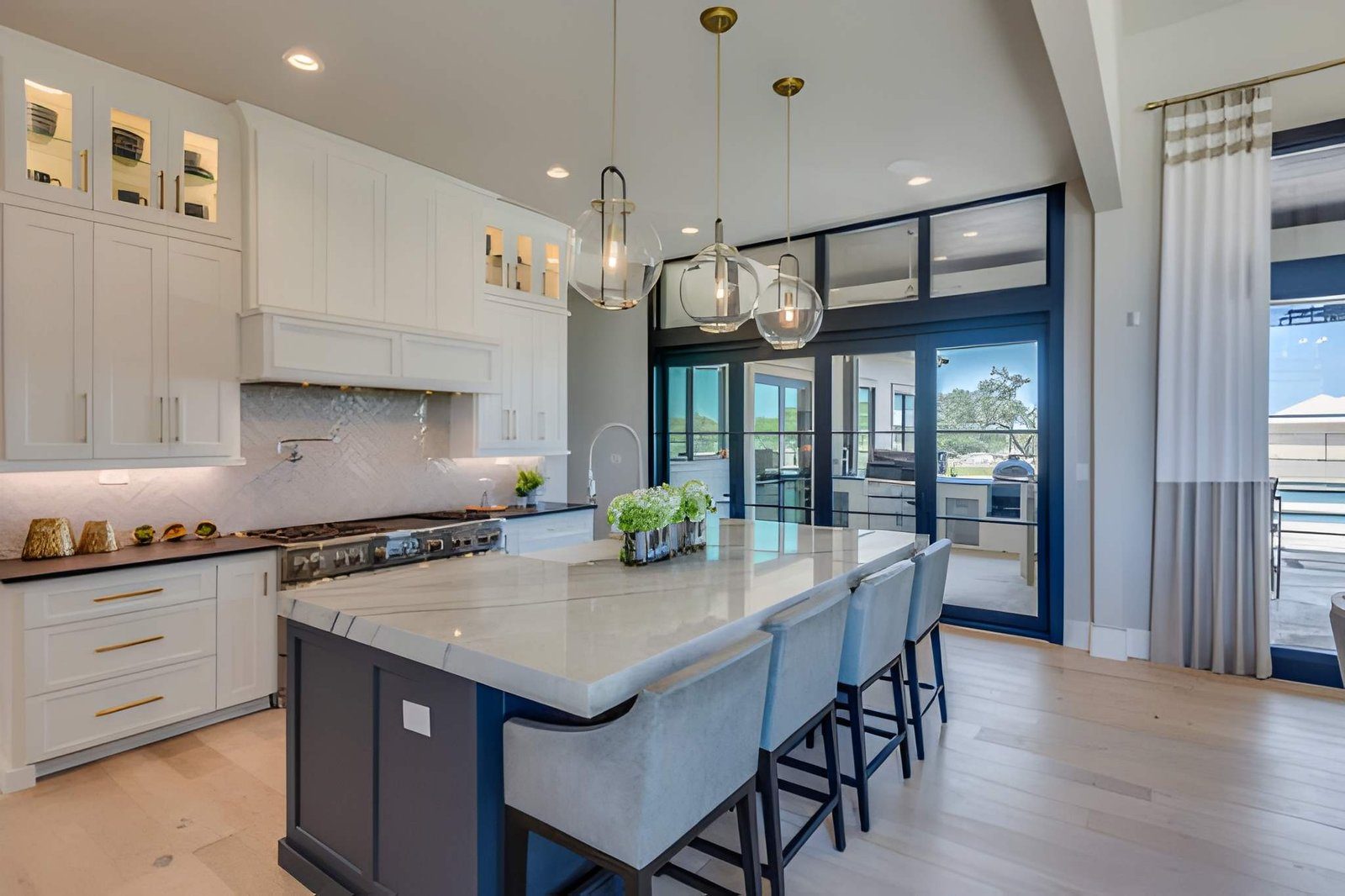 Finished open kitchen connected to a dining area in Victor, ID