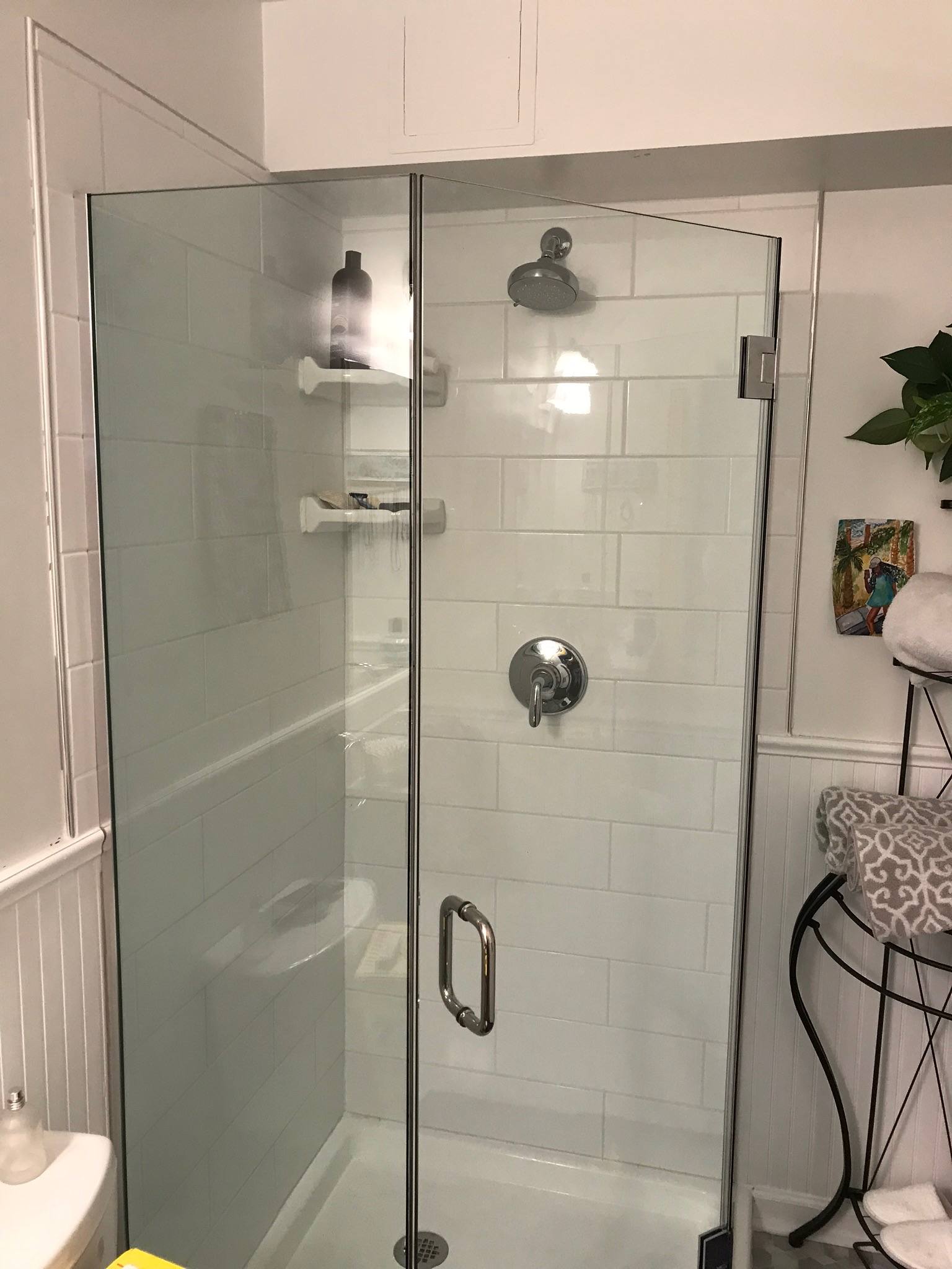Tile walk in shower with bench after a bathroom remodel in Victor, ID